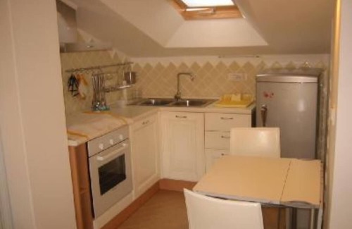 Oristano Apartment | Top floor penthouse apartment with terrace in the historical center, 3 km from the beach