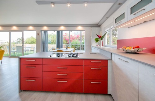 Puerto de la Cruz Condo | Top modern penthouse, heated pool, garden, beach within walking distance, parking space