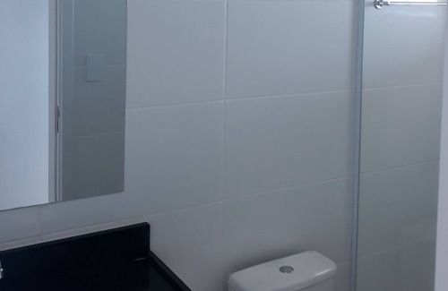 Praia Grande Apartment | TOTAL FRONT TO THE SEA- SACADA GOURMET with BARBECUE- 2 DORM (suite) - 10th FLOOR