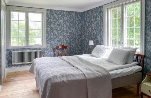 Mullsjo Hotel | Trädgårdshotellet Årås Säteri och Trädgårdar