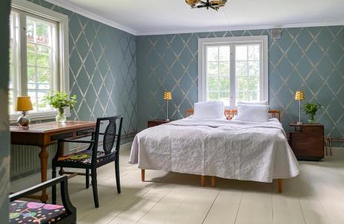 Mullsjo Hotel | Trädgårdshotellet Årås Säteri och Trädgårdar