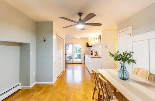 East Shore Apartment | Tranquil Apartment with Waterview & Patio, Walk to Beach!