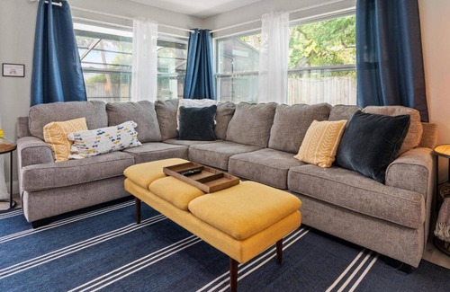 Hyde Park House | Tranquil Times a Serene 3BR Close to RJ Stadium with Screened Heated Pool, Outdoor Kitchen and Yard Chess