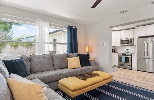 Hyde Park House | Tranquil Times | Serene 3BR Close to RJ Stadium | Screened Heated Pool | Patio Lounge area |Yard Che