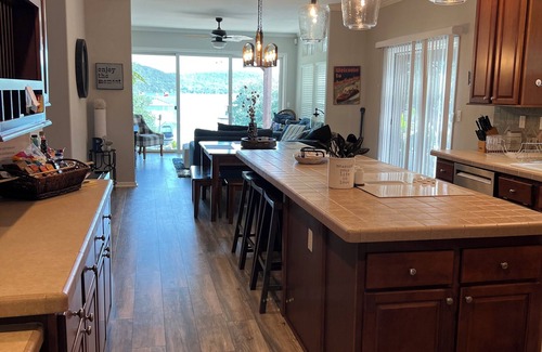 Graham House | Tranquil Waterfront property with a pool, hot tub & firepit.