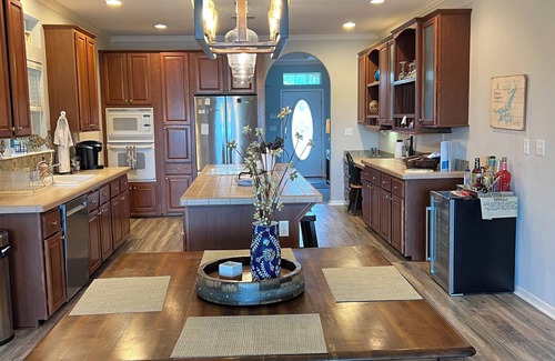 Graham House | Tranquil Waterfront property with a pool, hot tub & firepit.