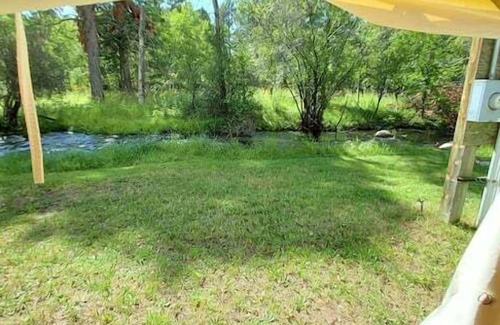 Saddlestring House | Trapper Wall Tent, Trapper Wall Tent by the Stream