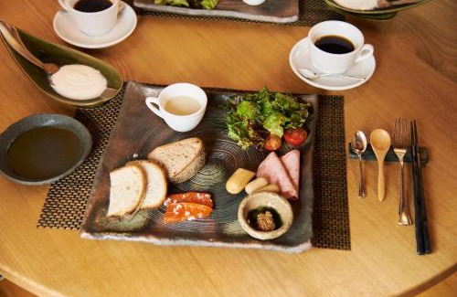 Tomi Hotel | Travel Stop UNNOWA