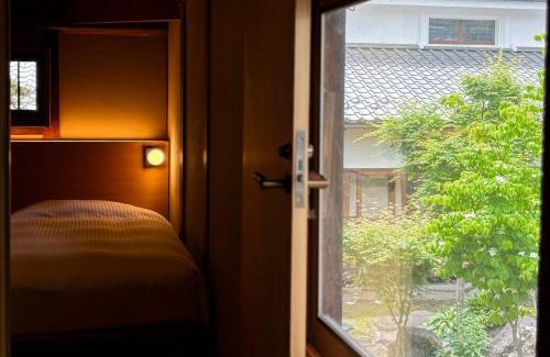 Tomi Hotel | Travel Stop UNNOWA