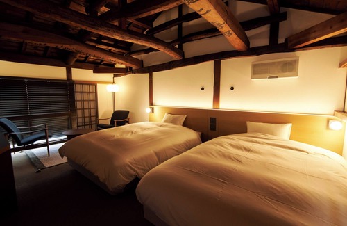 Tomi Hotel | Travel Stop UNNOWA