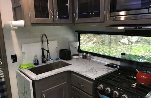 Norway House | Travel Trailer in the woods