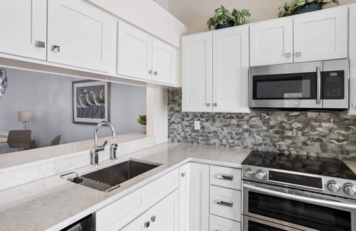 Capri Isle House | Treasure Isle Beach retreat; West-facing sunsets, 3 car garage, community pool!