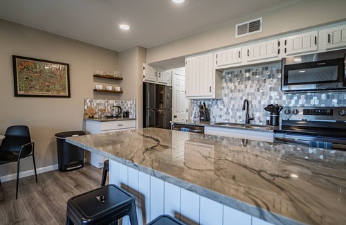 New Braunfels Condo | Treasure on the COMAL! Downtown with Pool/Hot Tub!