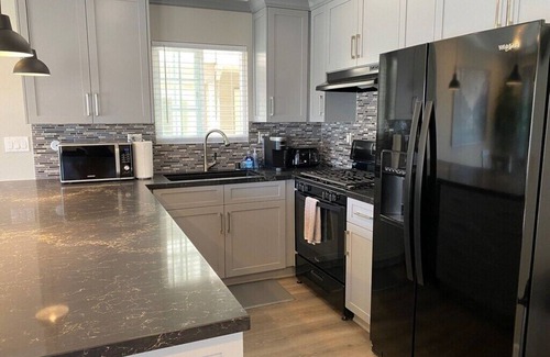 West Newport Condo | Treasured Retreat- 3 Houses from Beach-REMODELED - Exclusive Patio - Clean
