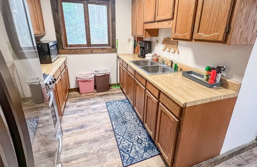 Wardsboro House | Tree-surrounded home with wood stove, spacious deck, gas grill - close to trails