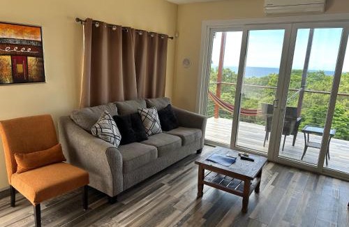 Antoneys Cay Cabin | Tree Top Suites & Resort
