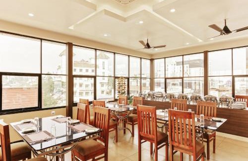 Thampanoor Hotel | Treebo Goodland Residency - 500m from Railway Station