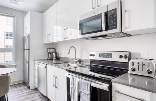St. Elizabeth's Apartment | Trendy Brighton Studio w/W/D, Gym, near T, Shops + Dining, by Blueground