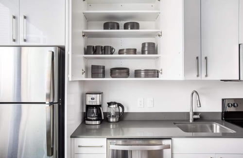 St. Elizabeth's Apartment | Trendy Brighton Studio w/W/D, Gym, near T, Shops + Dining, by Blueground