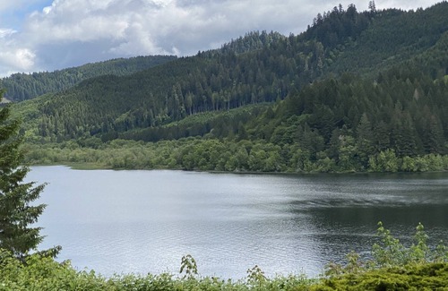 Blachly House | Triangle Lake View Home Nestled Amongst Trees on a hilltop Overlooking the Lake