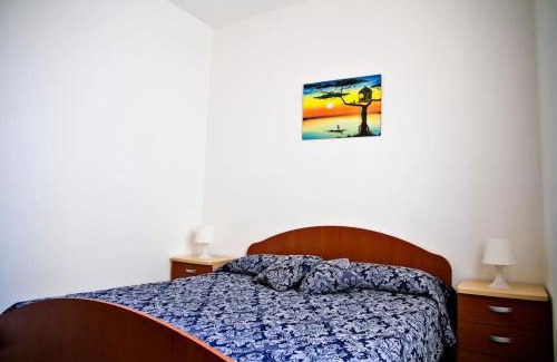 Torre San Giovanni Apartment | Trilocale a 50 mt dal mare con patio - Teresa Houses