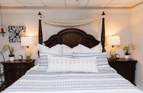 American Fork Bed & Breakfast | Tropical Jungle Themed Suite with real sand, King Bed
