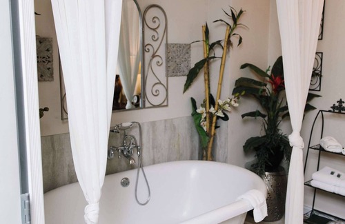 American Fork Bed & Breakfast | Tropical Jungle Themed Suite with real sand, King Bed