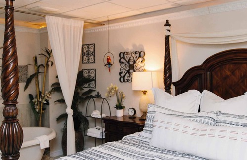 American Fork Bed & Breakfast | Tropical Jungle Themed Suite with real sand, King Bed