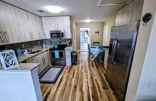 Titusville House | Tropical Lagoon Getaway: River View ~ Hot Tub
