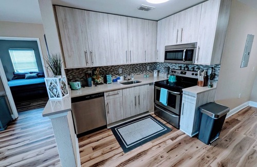 Titusville House | Tropical Lagoon Getaway: River View ~ Hot Tub