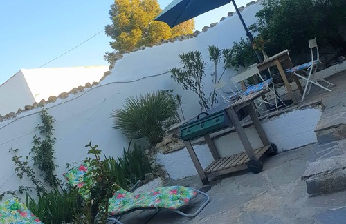 Cullar Apartment | Tropical oasis, rural Andalucía—tropical garden, huge pool, perfect for couples