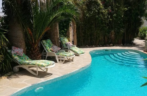 Cullar Apartment | Tropical oasis, rural Andalucía—tropical garden, huge pool, perfect for couples