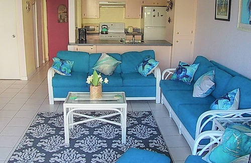 Williams Town Condo | Tropical Oasis: Ocean View ~ Pool & Bar ~ Family-Friendly