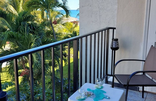 Williams Town Condo | Tropical Oasis: Ocean View ~ Pool & Bar ~ Family-Friendly