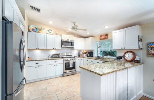 Big Pine Key House | Tropical Oasis with Beautiful Home, Pool, Dock and Tiki Hut