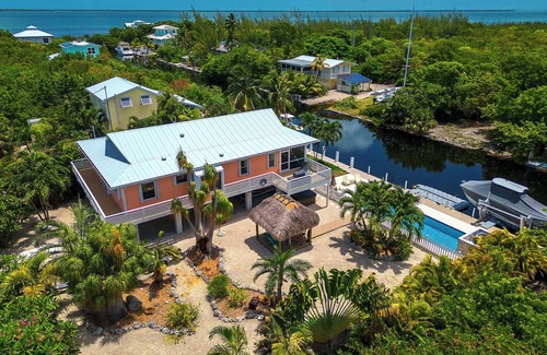 Big Pine Key House | Tropical Oasis with Beautiful Home, Pool, Dock and Tiki Hut