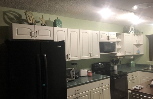 Flor-a-mar House | Tropical Waterfront 2bdrm sleeps 6 w/boat slip available behind home!