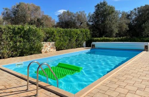 San Michele Salentino Villa | 'Trullo della Luna' tipico casale in un uliveto, piscina esclusiva