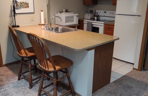 The Galena Territory House | Tucked back on the 1st Tee of the South Course - cozy townhome.