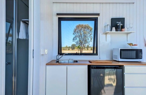 Burrum River House | Turtle Island Lakeside Tiny House 1 by Tiny Away