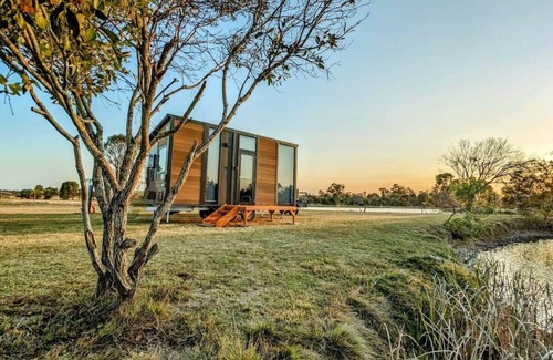 Burrum River House | Turtle Island Lakeside Tiny House 1 by Tiny Away