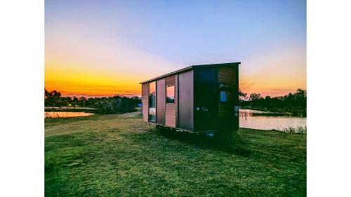 Burrum River House | Turtle Island Lakeside Tiny House by Tiny Away