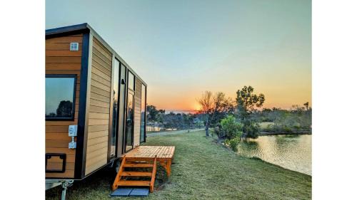 Burrum River House | Turtle Island Lakeside Tiny House by Tiny Away