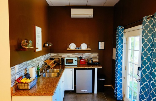 Bonita House | Turtle-themed tiny house with a turtle pond, hot tub, e-bikes, and EV charging