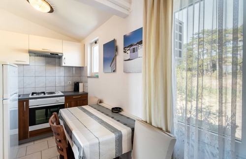 Lopar Apartment | Two bedroom apartment with balcony and sea view Lopar, Rab (A-14070-c)