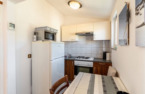 Lopar Apartment | Two bedroom apartment with balcony and sea view Lopar, Rab (A-14070-c)