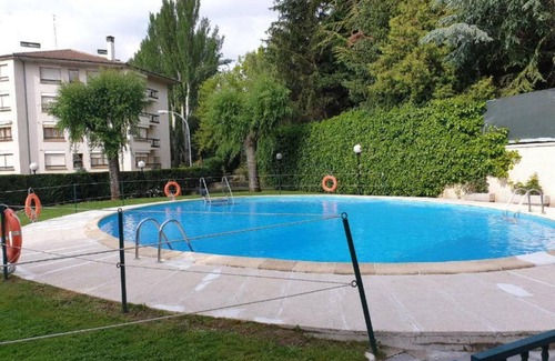 Jaca Apartment | Two-Bedroom Apartment with Pool, Balcony, and Garage in Tranquil Jaca