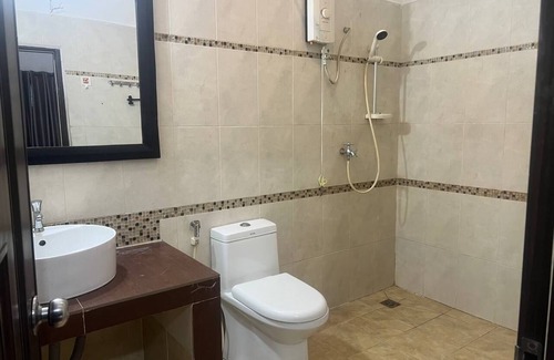 Daun Penh Apartment | Two bedroom apartment with an outdoor balcony area facing the Mekong River.