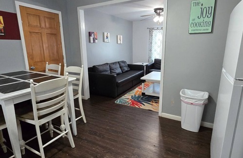 Monticello Cabin | Two Bedroom Cabin - "The Big One" - This spacious cabin gets it's name honestly! Cabin is 800 sq ft with two-bedrooms feature three (3) queen beds, one (1) full size bed, and two (2) futons allow for a max of twelve (12) people. Conveniently located