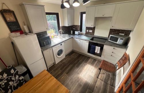 Milton Keynes House | Two Bedroom Central MK Self Catering House Sleeps 4 - Free Parking & fast WiFi - by Webbhill Stays